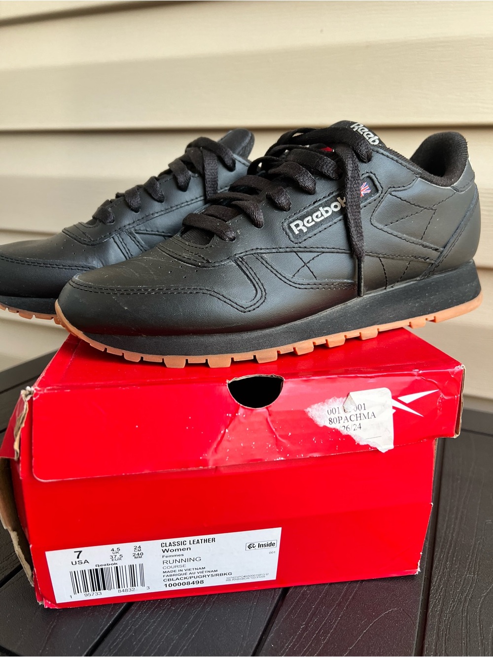 Reebok Black Leather women’s Sneakers with Gum Outsole
